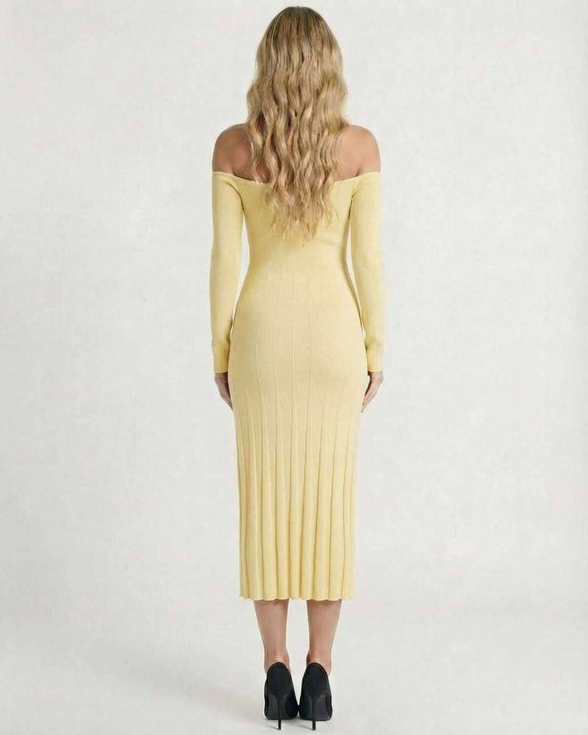 Back view of Solara Midi Dress by Lauven in soft yellow ribbed knit, showcasing elegant off-shoulder design.