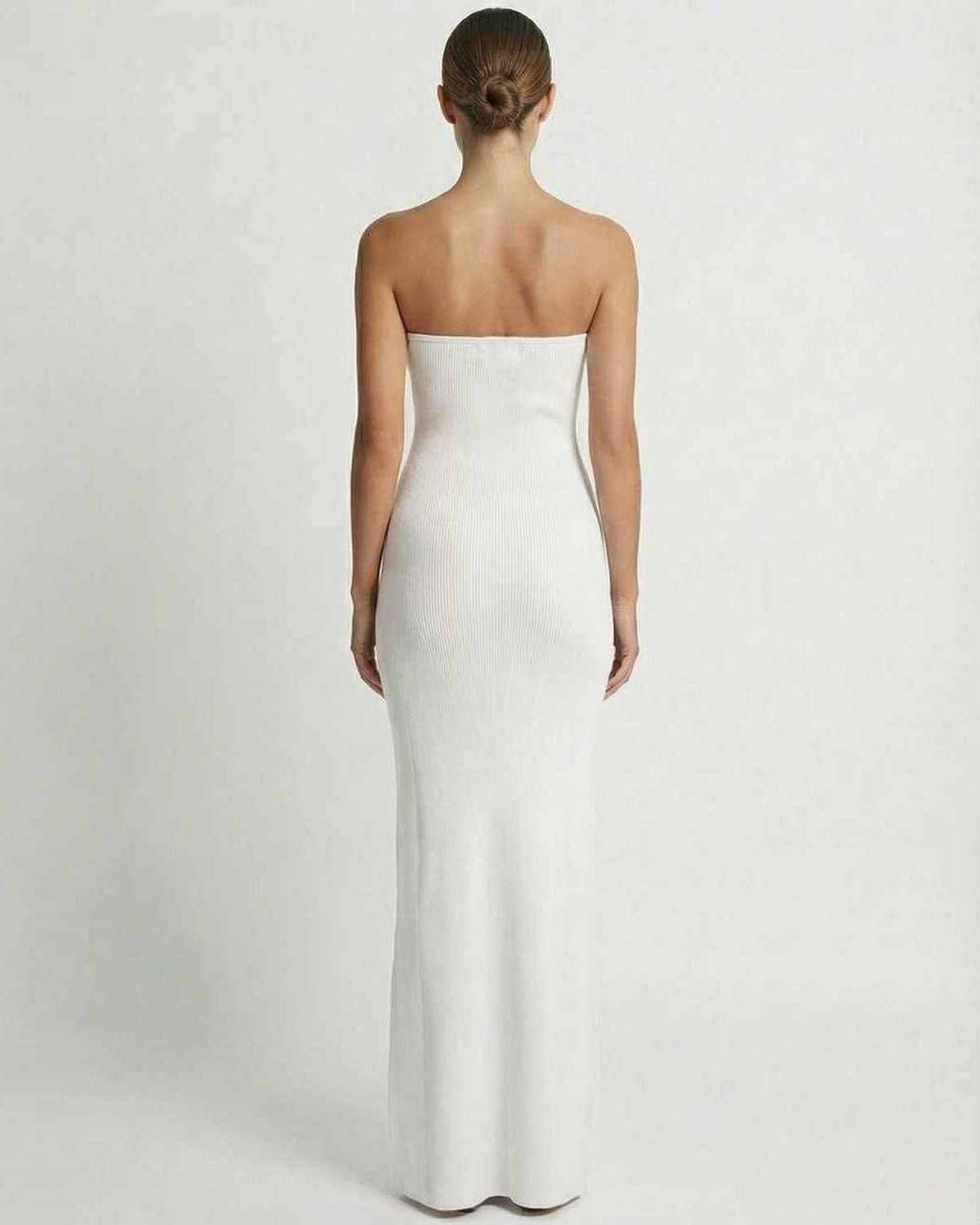 Back view of the strapless Lunaire Maxi Dress by Lauven, showcasing a sleek slim fit and ankle-length design in white.