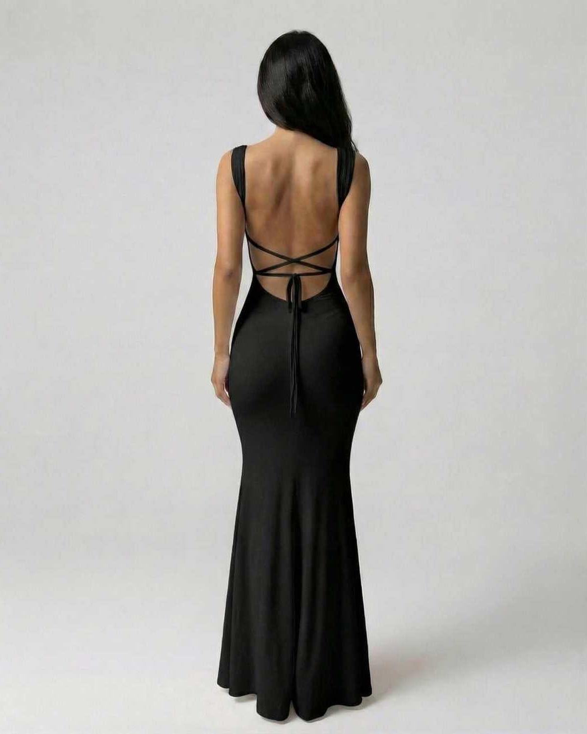 Onyx Maxi Dress by Lauven, showcasing the sophisticated strappy back silhouette in classic black.