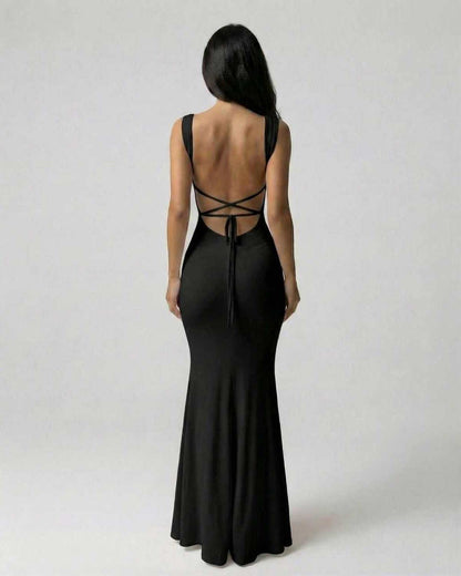 Onyx Maxi Dress by Lauven, showcasing the sophisticated strappy back silhouette in classic black.