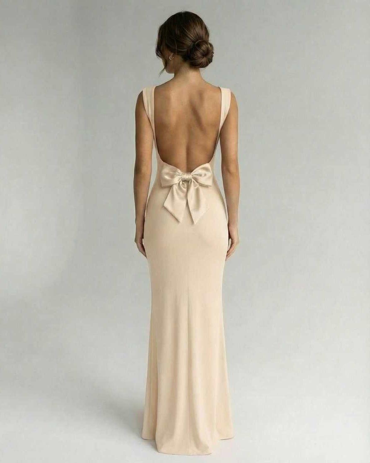 Seraphina Maxi Dress by Lauven - Sleek strappy back ankle-length dress in soft beige with elegant bow detail.