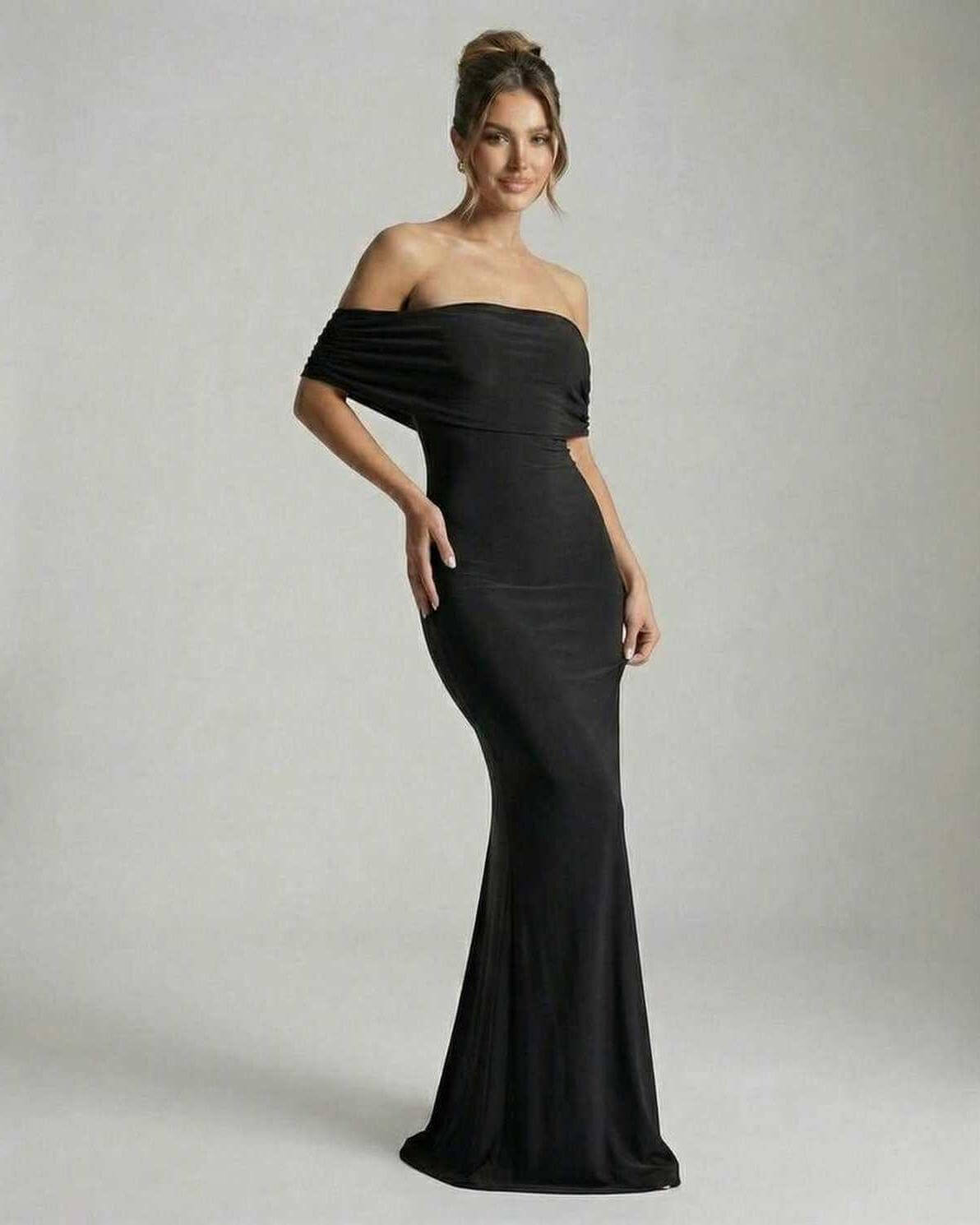 Lauven Noir Maxi Dress featuring an elegant off-shoulder silhouette in classic black, perfect for any formal occasion.