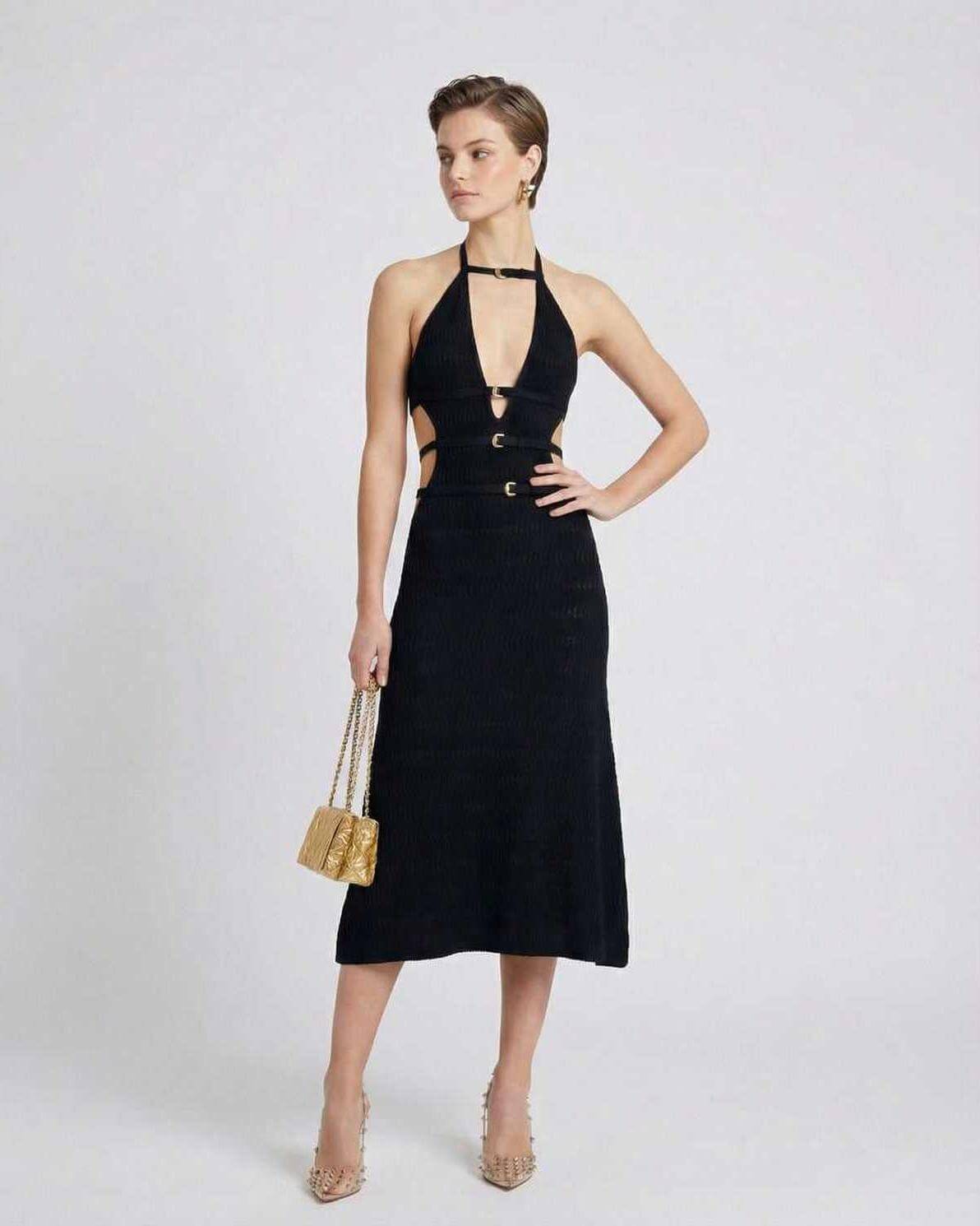 Nova Midi Dress from Lauven, showcasing a sleek knit design with a sexy A-line silhouette and captivating V-neckline.