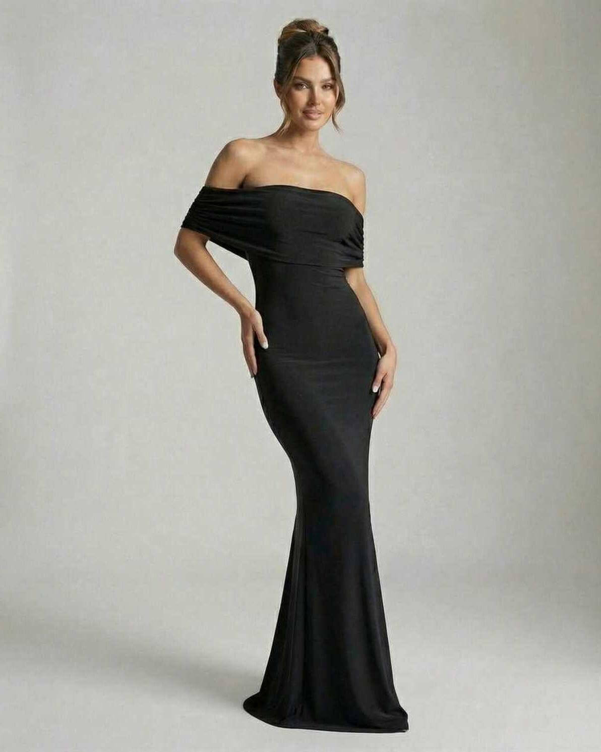 Noir Maxi Dress by Lauven, elegant off-shoulder black dress with ruched detailing and floor-length silhouette.