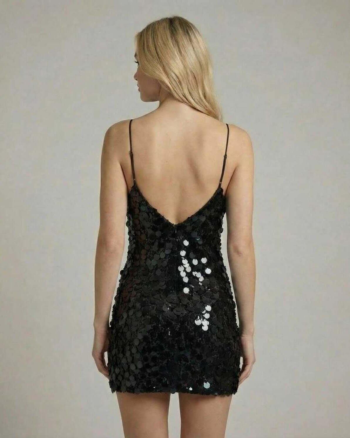 Luna Mini Dress by Lauven, black sequin bodycon mini dress showcasing a flattering V-neckline and spaghetti straps.