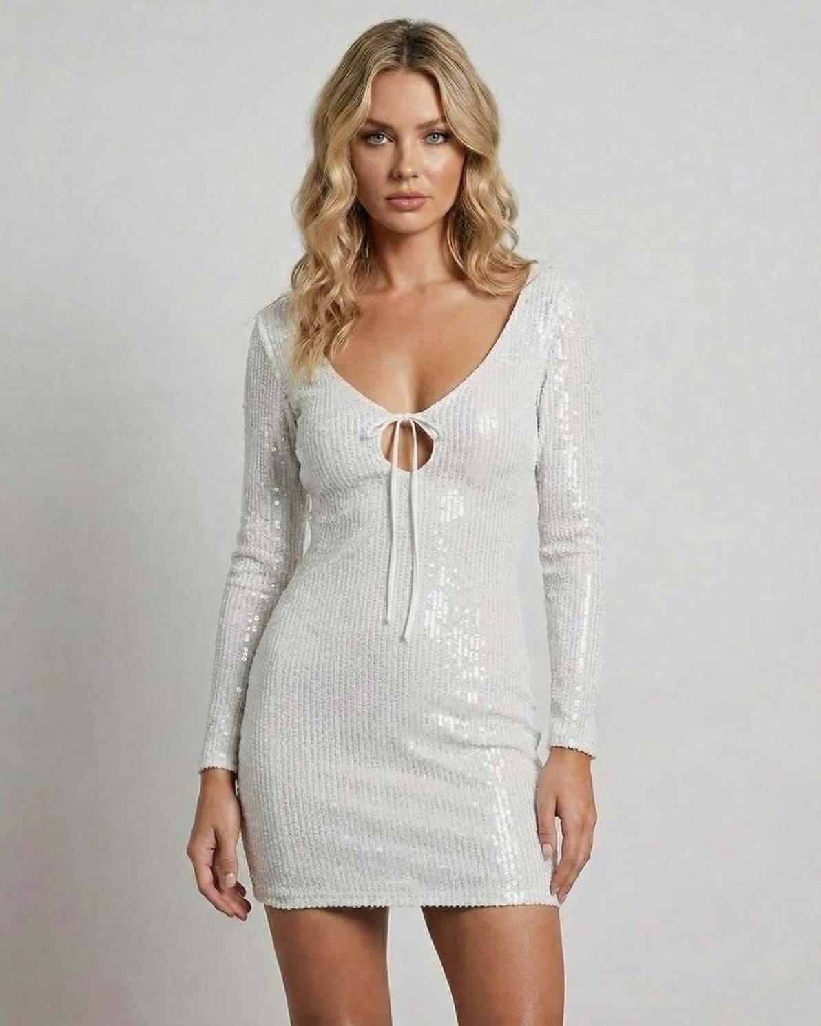 Luna Mini Dress by Lauven, elegant white sequin bodycon dress featuring a flattering silhouette and long sleeves.