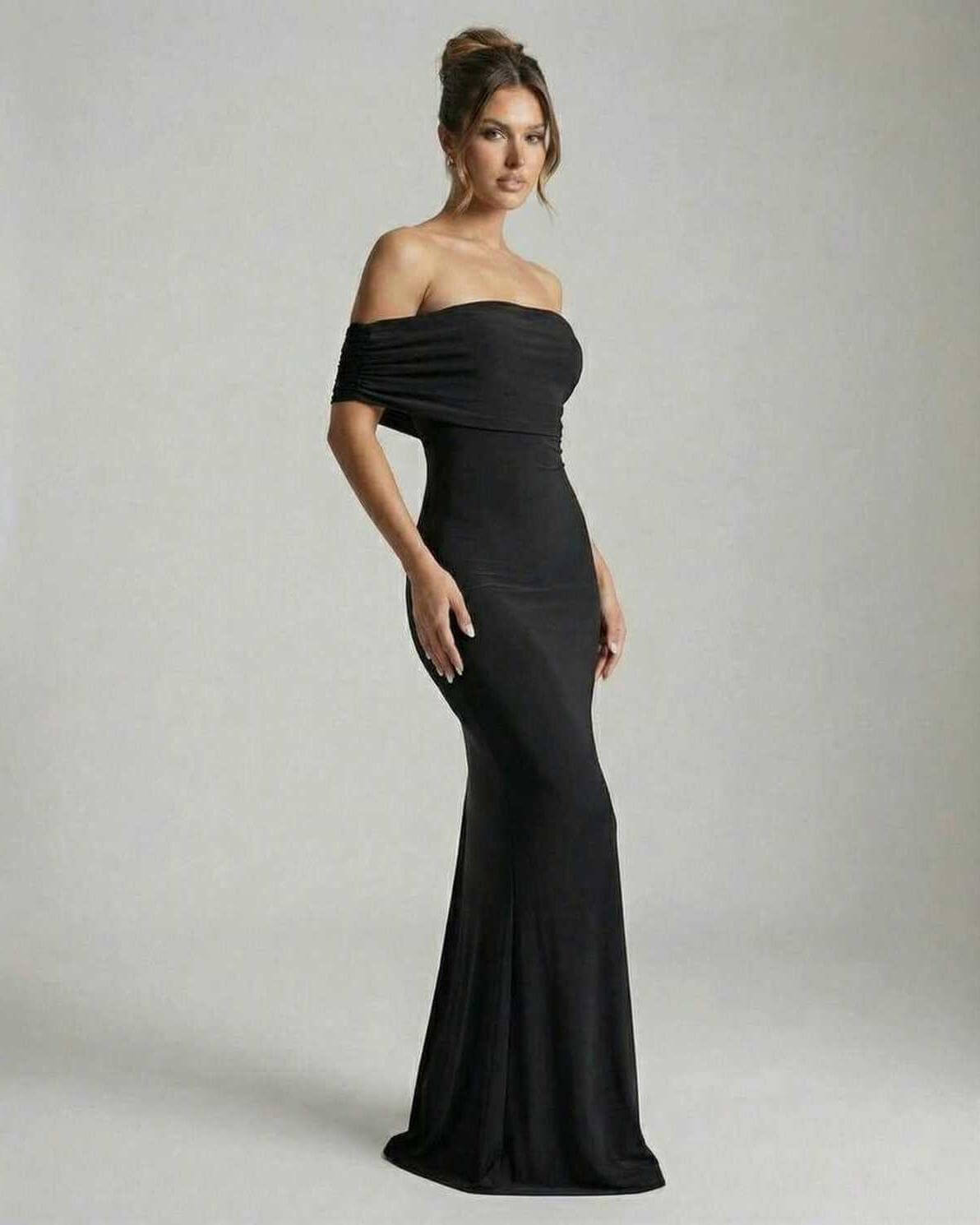 Noir Maxi Dress by Lauven — Elegant off-shoulder silhouette in classic black fabric.