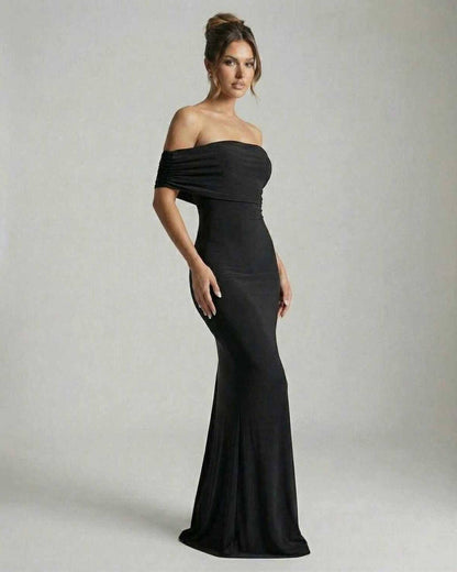 Noir Maxi Dress by Lauven — Elegant off-shoulder silhouette in classic black fabric.