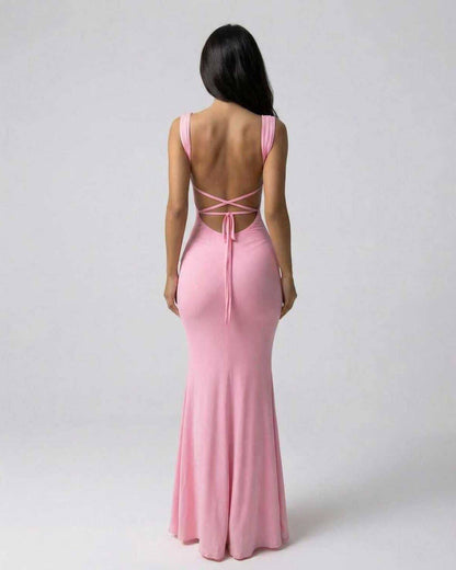 Back view of Lauven Blush Maxi Dress showcasing the sleek design and elegant silhouette in soft pink.