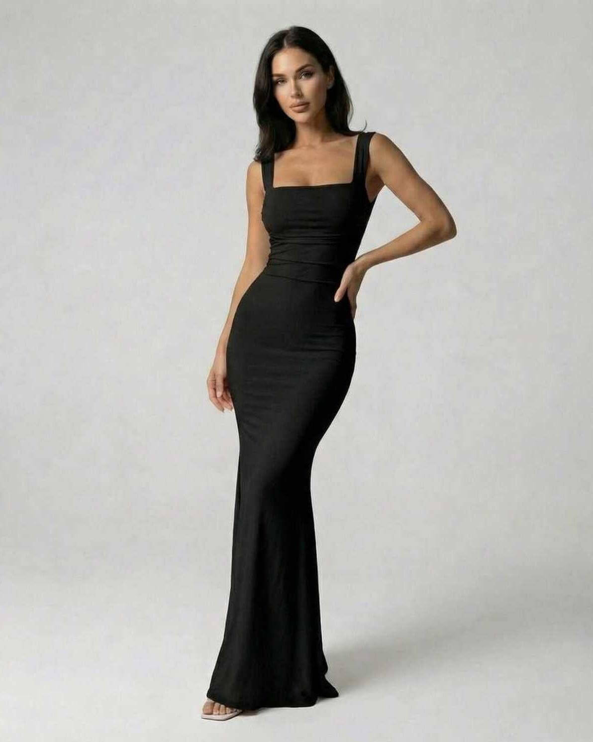 Onyx Maxi Dress by Lauven featuring a strappy back silhouette in classic black and figure-flattering fit.