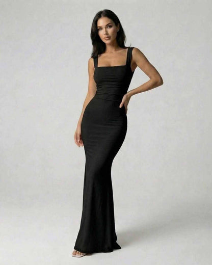 Onyx Maxi Dress by Lauven featuring a strappy back silhouette in classic black and figure-flattering fit.