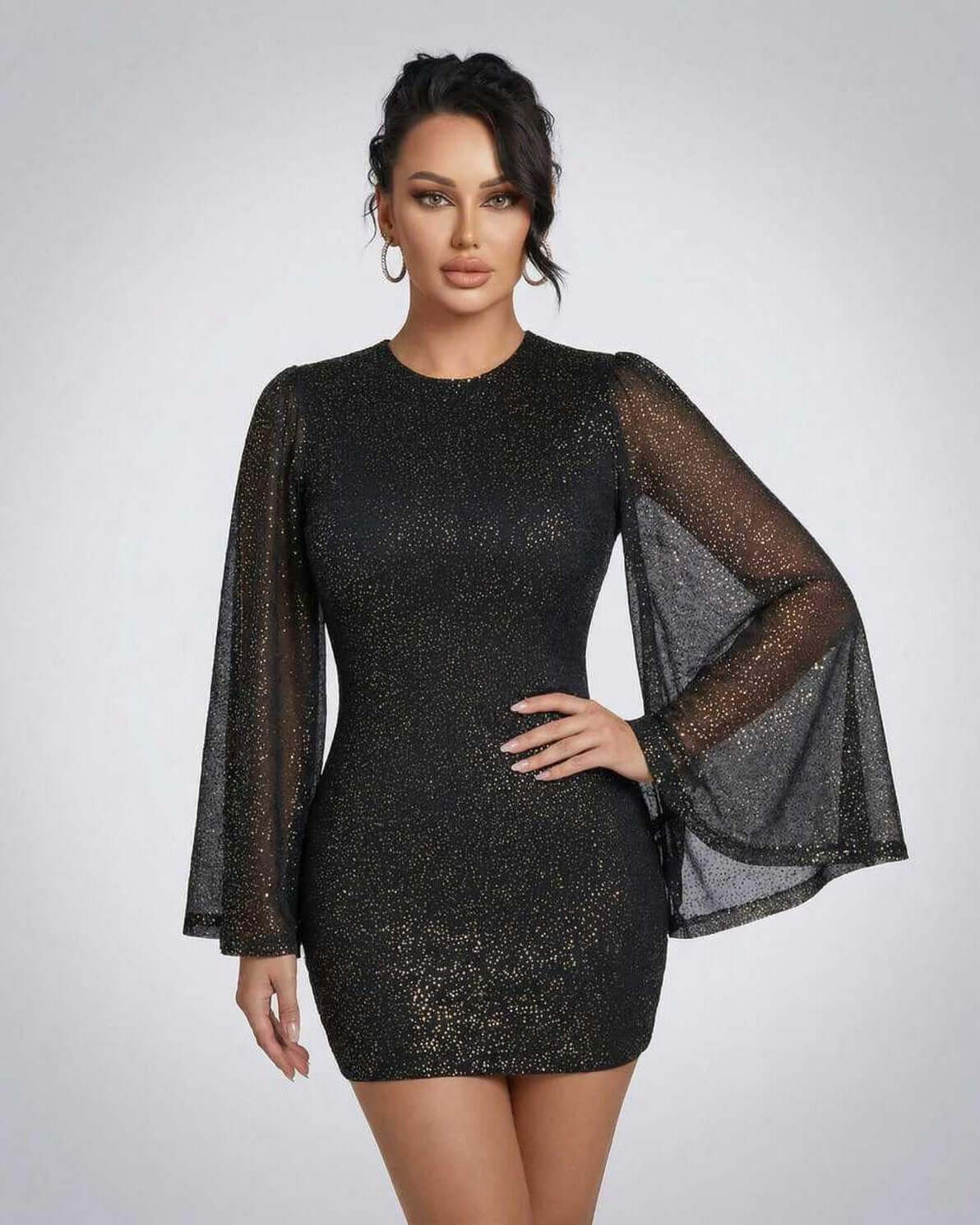 Celeste Mini Dress by Lauven, showcasing sheer cloak sleeves and sparkling dot pattern, perfect for modern elegance.