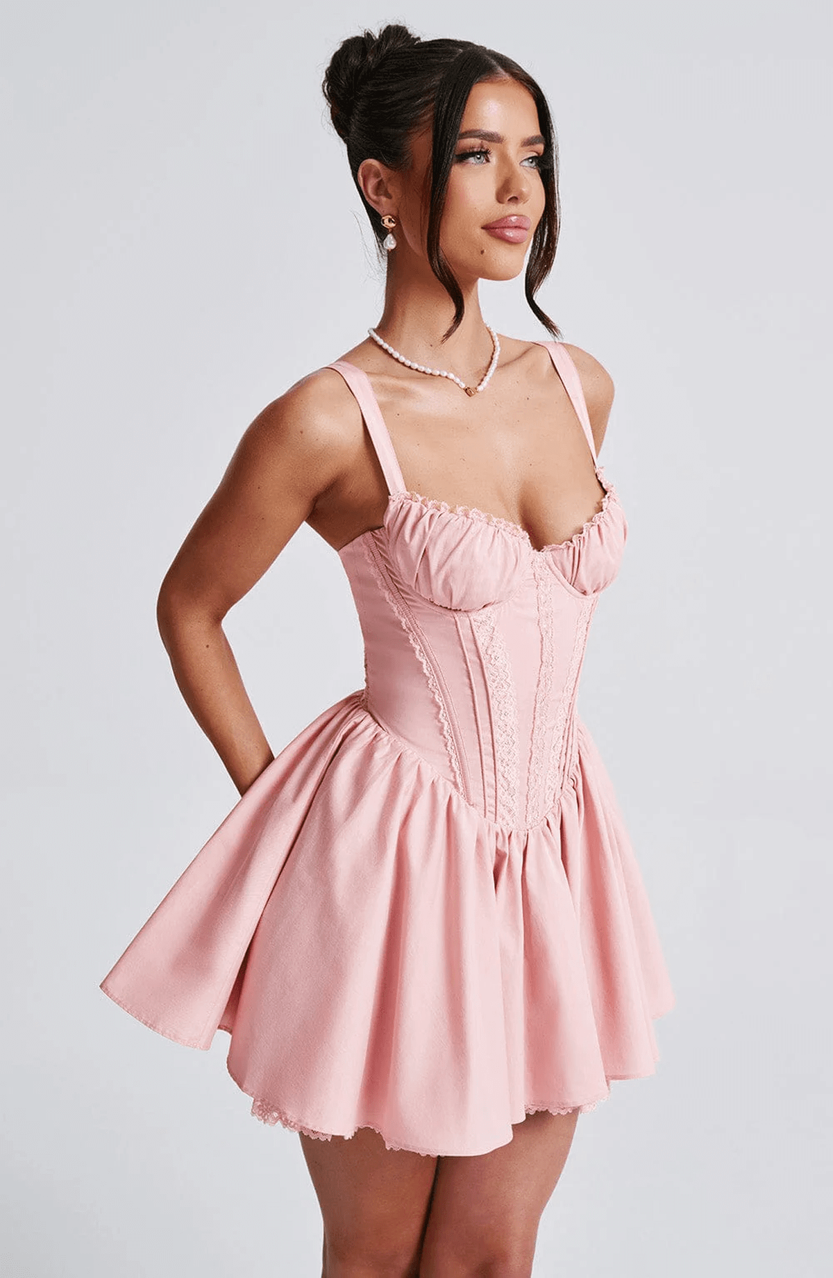 Pink Barbie Mini Dress with corset design and flared skirt, perfect for summer parties and weddings.
