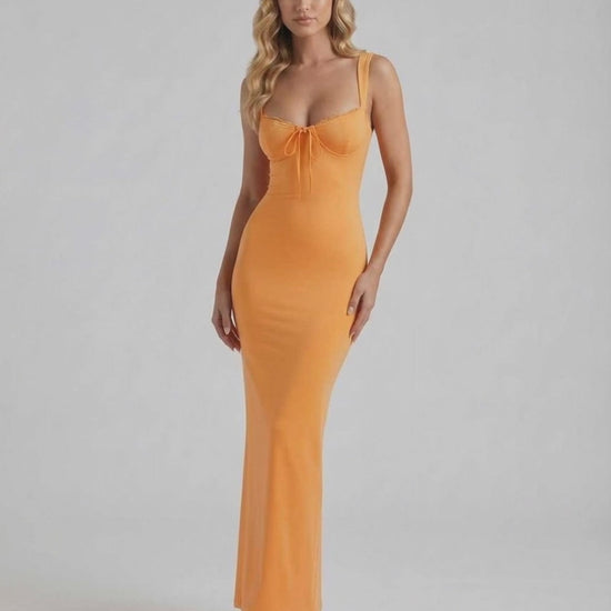 Soleil Maxi Dress in vibrant orange, featuring slim fit, lace trim, V-neck, spaghetti straps by Lauven.