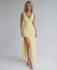 Solara Maxi Dress - Yellow with ruffle slit, flowing silhouette, and elegant design by Lauven. Perfect for summer and formal occasions.