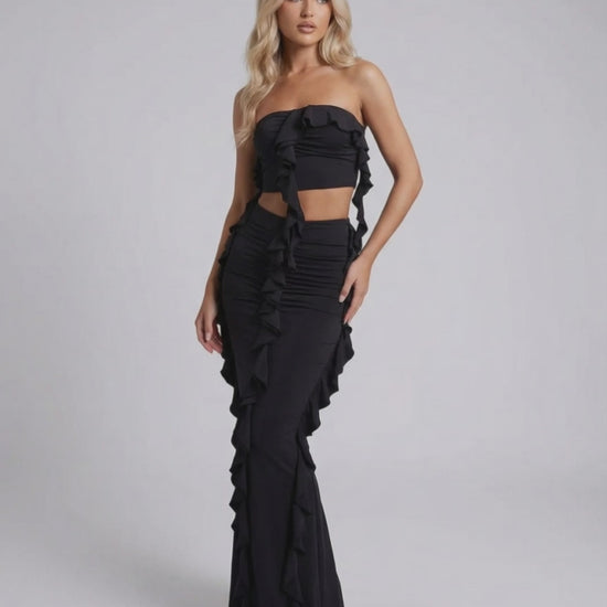 Luna Maxi Dress by Lauven, elegant black sheath with ruffle detail, sleeveless and ankle-length, perfect for special occasions.