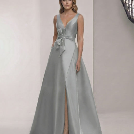 Lunaria Maxi Dress: A-line grey sage satin dress with V-neck, bow detail, and elegant floor-length skirt by Lauven.