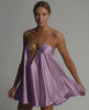 Celeste Mini Dress by Lauven in lavender satin, featuring A-line flared silhouette and beaded spaghetti straps.