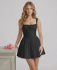 Onyx Mini Dress by Lauven features a structured corset bodice and flared skirt in classic black cotton blend.