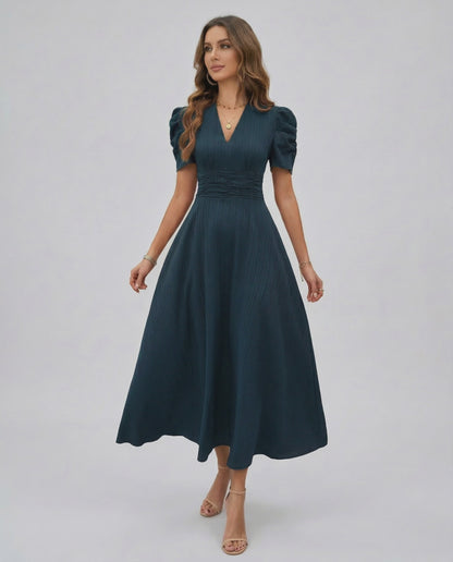 Orion Midi Dress in dark teal, featuring V-neckline, puff sleeves, cinched waist for timeless elegance by Lauven.