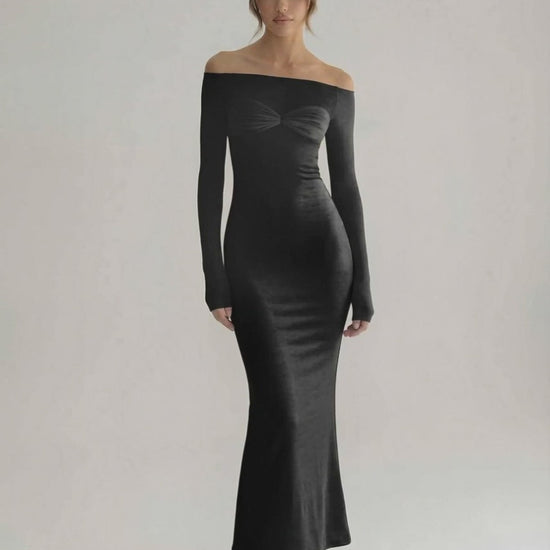 Celeste Maxi Dress - Elegant black sheath silhouette with off-shoulder design by Lauven, perfect for modern occasions.