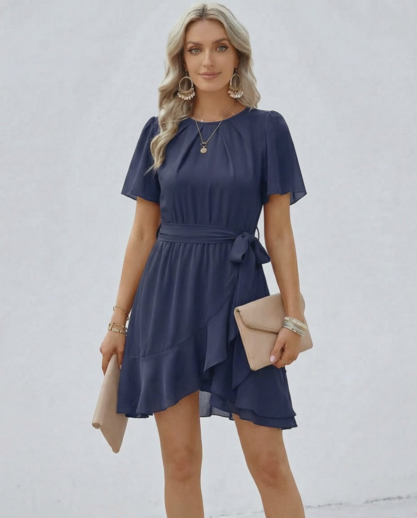 Navy Ruffle Dress by Lauven, featuring flutter sleeves and a flattering waist tie for sophisticated style.