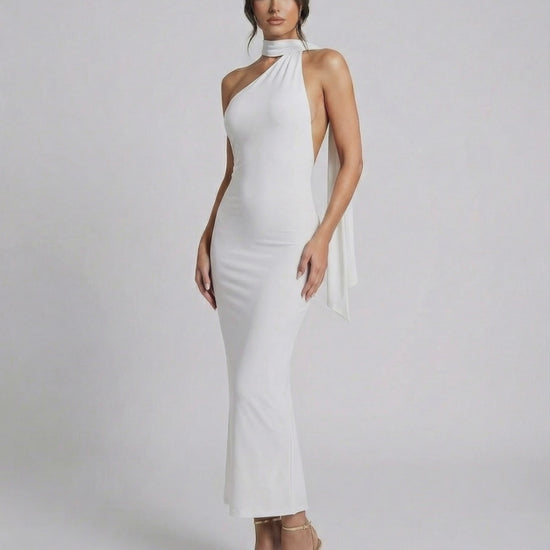 Luna Maxi Dress by Lauven - Elegant white halter neck gown with asymmetric cutout and sleek silhouette.