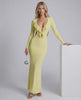 Zahara Maxi Dress in yellow with ruffle V-neck and open back, showcasing bodycon fit and elegant design by Lauven.