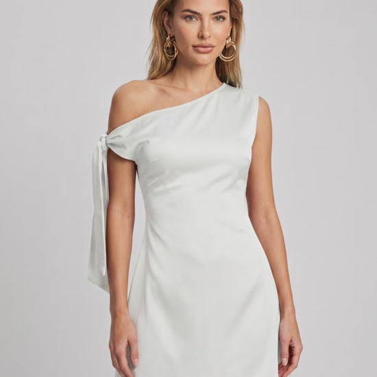 Veloura Mini Dress featuring a satin finish and asymmetric neckline by Lauven, perfect for modern, stylish occasions.