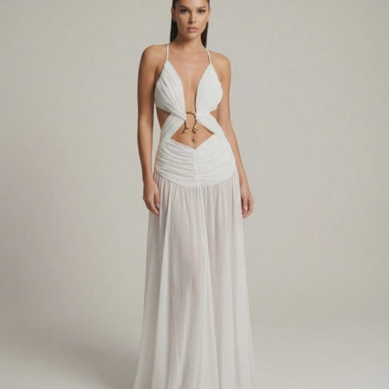 Seraphina Maxi Dress showcasing a deep V-neck, cut-out detail, and flowing silhouette by Lauven.