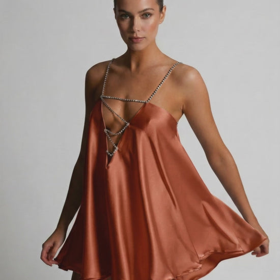 Lauven Copper Mini Dress showcasing luxurious satin A-line with rhinestone detail.