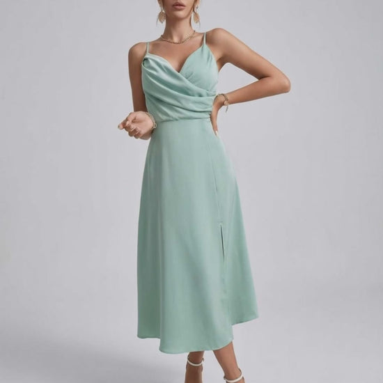 Selene Midi Dress in mint green satin, featuring refined spaghetti straps and a draped bodice, perfect for weddings by Lauven.