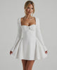 Lauven Luna Mini Dress featuring a classic white color, square neckline, long fitted sleeves, and flared skirt.
