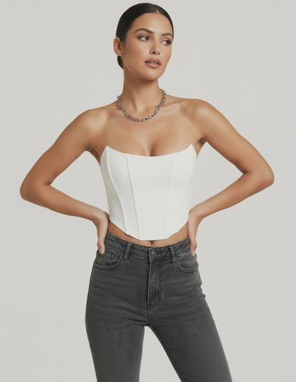 Model wearing the Luna Corset Top by Lauven, featuring a structured white velvet design and chic styling.