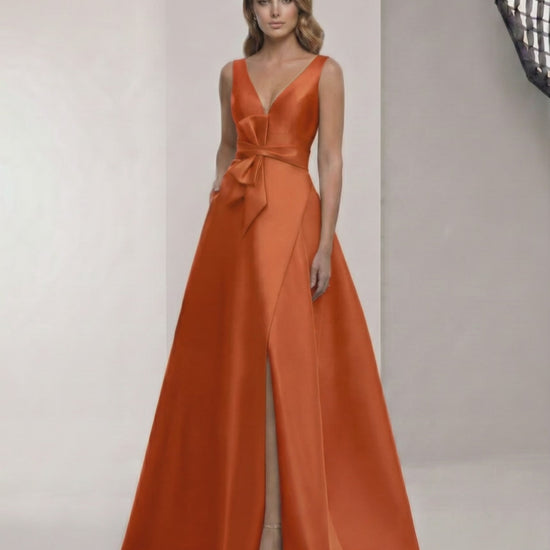 Elaris Maxi Dress - Elegant orange satin dress with A-line silhouette, wrap slit, bow waist. From Lauven brand.