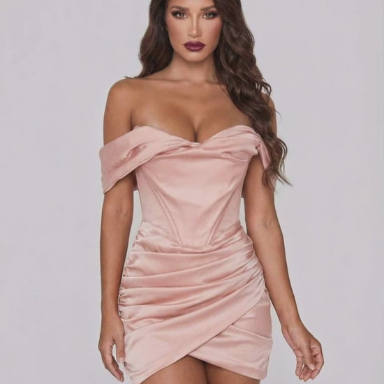 Lauven Orion Mini Dress in blush satin, off-shoulder neckline, elegant body-skimming silhouette with draped fold design.