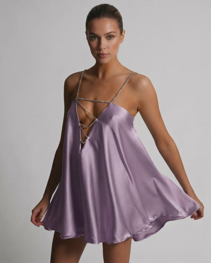 Lyra Mini Dress by Lauven in soft lilac, featuring a luxurious satin finish and rhinestone detail, perfect for summer occasions.