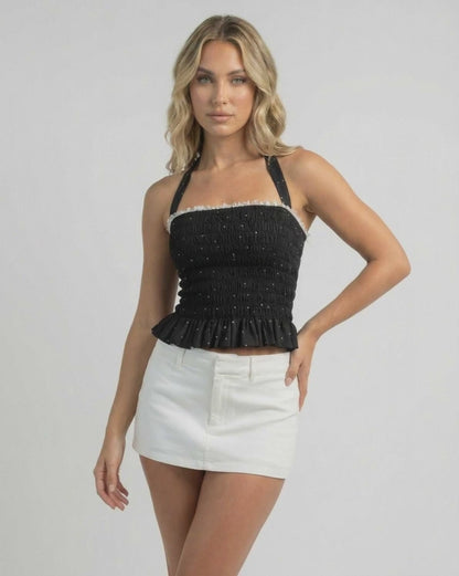 Luna Top by Lauven - Women's halter polka dot ruffle top in black, perfect for day-to-night styling.