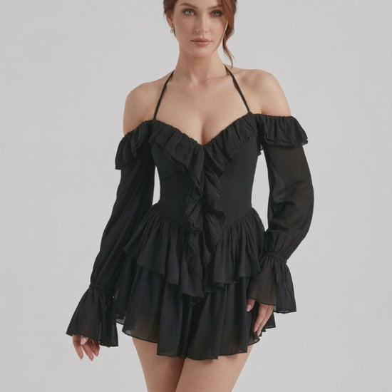 Ravelle Mini Dress by Lauven – Black halter ruffle mini dress with sheer sleeves and layered details.
