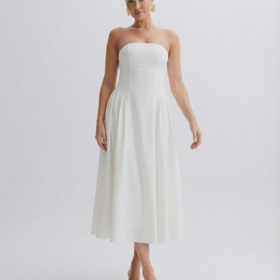 Elara Midi Dress - Strapless white pleated dress by Lauven, featuring a sculpted silhouette and elegant movement.