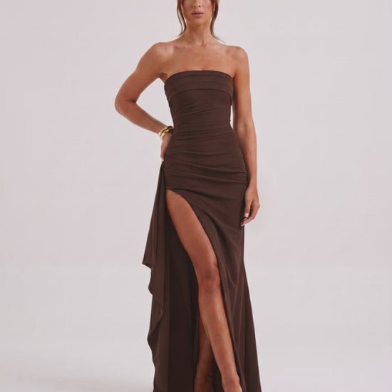 Solenne Maxi Dress featuring a strapless design, dramatic side slit, and luxurious brown fabric by Lauven.