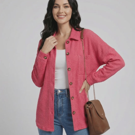 Women wearing a pink Verona Jacket by Lauven, featuring a waffle knit texture and casual longline fit.