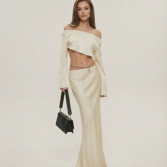 Aura Midi Dress by Lauven in luxurious champagne satin with off-shoulder design and sleek silhouette, perfect for upscale events.