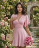 Elara Mini Dress in soft pink chiffon blend with V-neckline, A-line silhouette by Lauven, perfect for warm weather occasions.