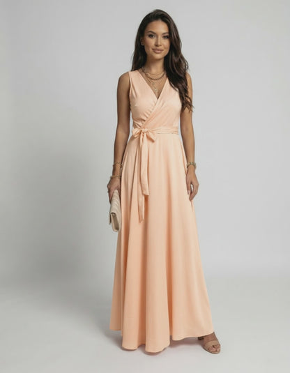 Serena Maxi Dress by Lauven in soft peach, featuring a V-neck silhouette and flowing length for elegant style.