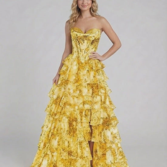 Solara Maxi Dress by Lauven, a stunning yellow floral tiered chiffon gown with a sweetheart neckline and layered skirt.