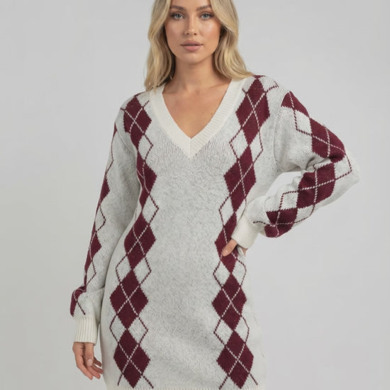 Arden Mini Dress in soft acrylic knit, featuring cozy argyle pattern, V-neckline, and relaxed fit by Lauven.