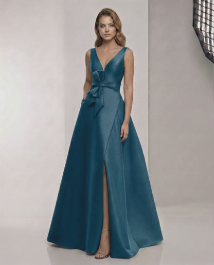 Orion Maxi Dress - Satin A-Line teal dress with V-Neck, bow detail, elegant and timeless style by Lauven.