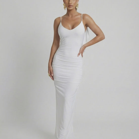 Celeste Maxi Dress by Lauven, elegant white sleeveless bodycon with spaghetti straps and smooth fit.