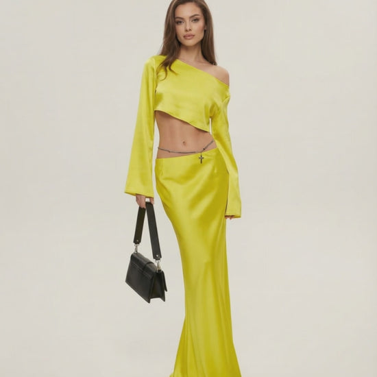 Vega Midi Dress by Lauven, sleek asymmetrical silhouette in vibrant yellow, perfect for modern elegant styling.